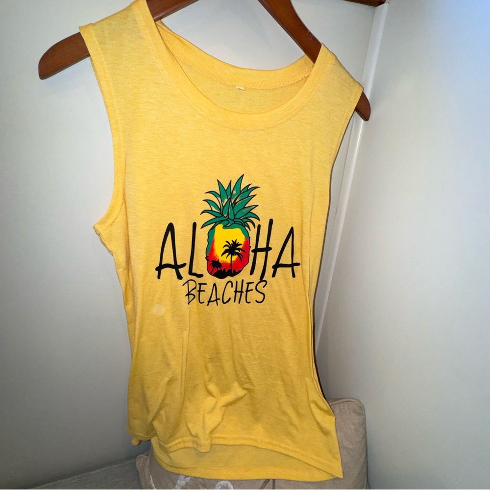 Yellow aloha pineapple, size medium tank top.